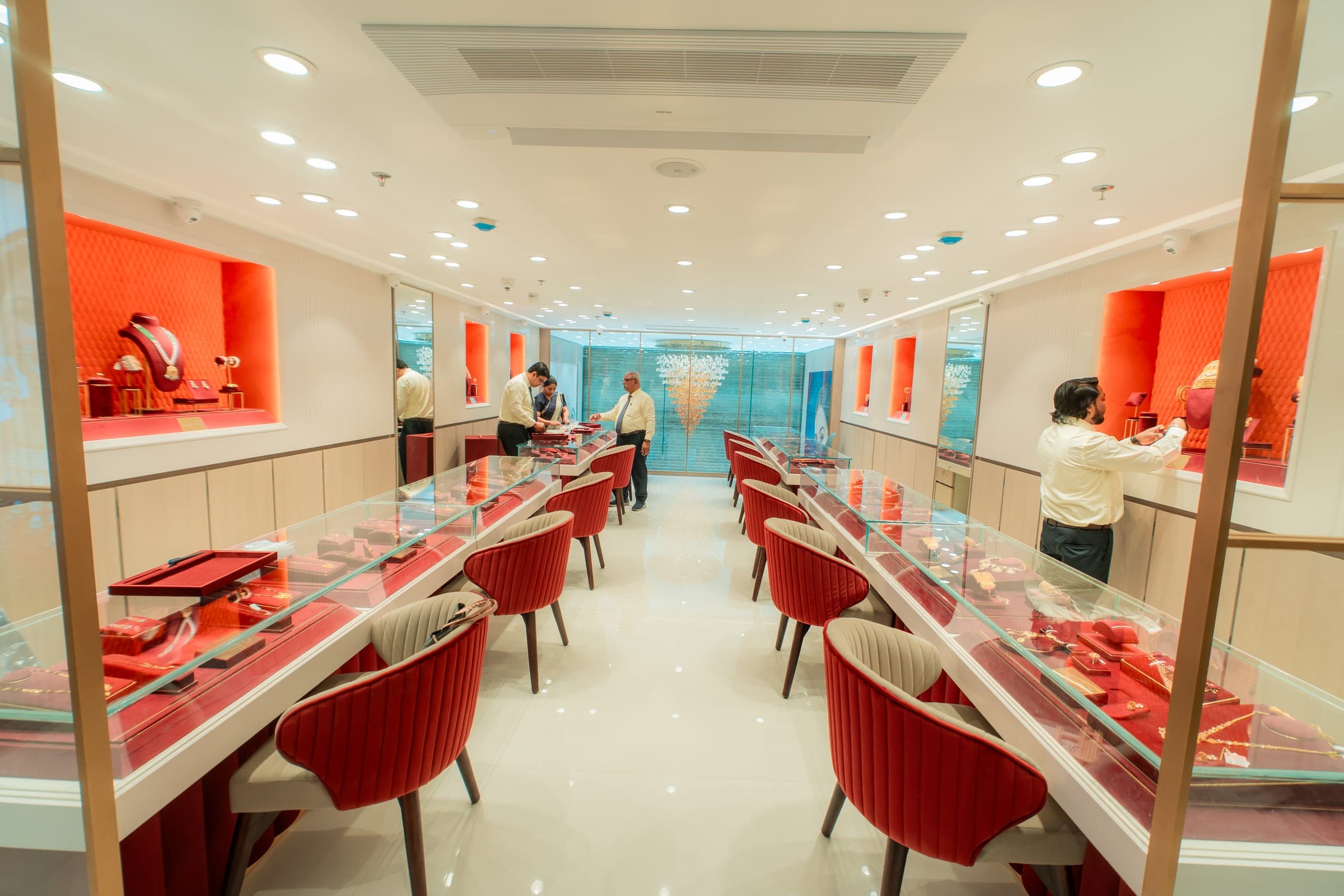 Customers being served at the display counters inside the Ashok Jewels showroom, Sardarpura, Jodhpur