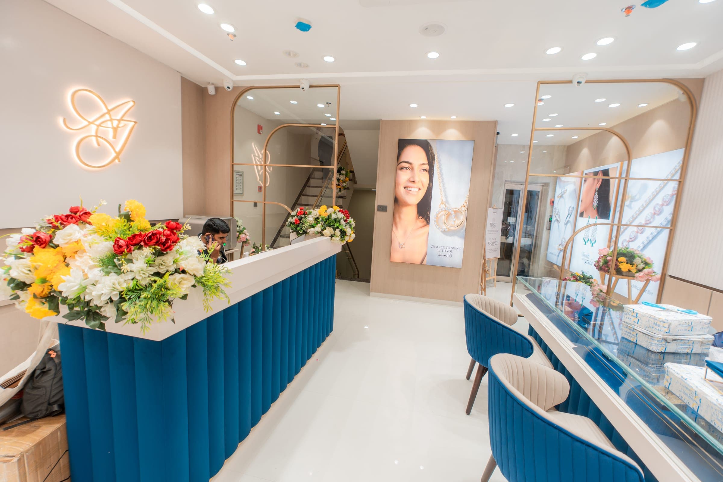 Reception desk and Ashok Jewels monogram at the showroom entrance in Sardarpura, Jodhpur